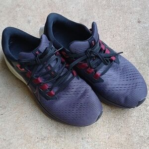 Nike Red and‎ Black Athletic Shoes with Streamlined Design